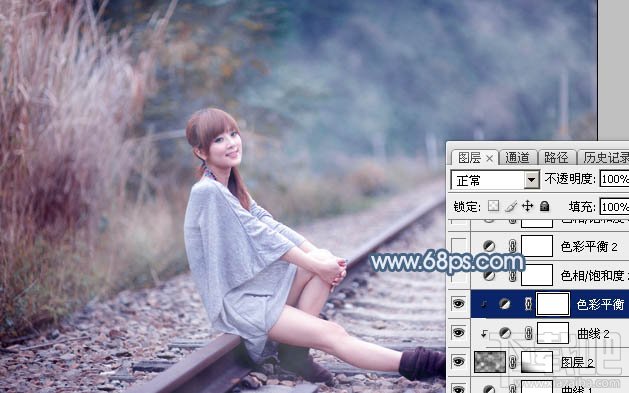 如何用Photoshop CC给铁轨上的美女加上梦幻的淡蓝色