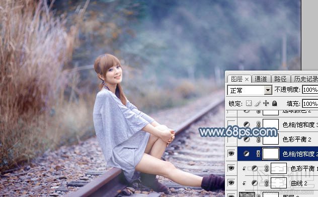 如何用Photoshop CC给铁轨上的美女加上梦幻的淡蓝色