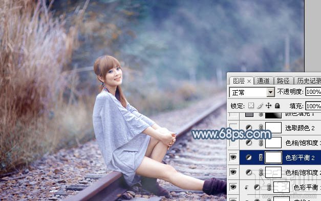 如何用Photoshop CC给铁轨上的美女加上梦幻的淡蓝色