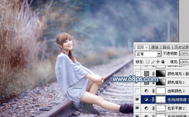 如何用Photoshop CC给铁轨上的美女加上梦幻的淡蓝色