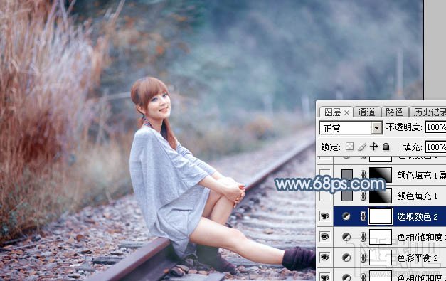 如何用Photoshop CC给铁轨上的美女加上梦幻的淡蓝色