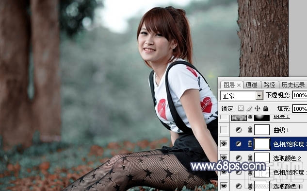 如何用Photoshop CC给树林美女图片加上流行暗调蓝红色