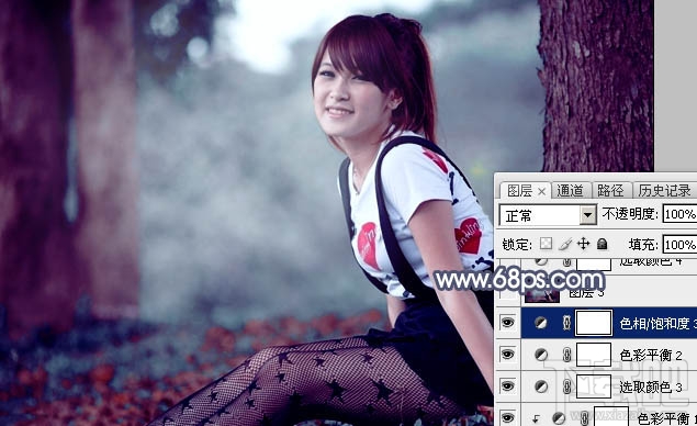 如何用Photoshop CC给树林美女图片加上流行暗调蓝红色